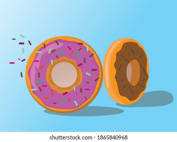 two donuts with multicolor topping and chocolate 