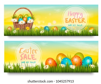 Two Easter Sale banners. Colorful eggs in basket on green grass. Vector.