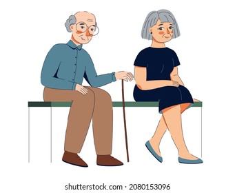 two elderly people sitting on the bench