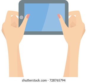 Two elegant woman hands playing on a tablet