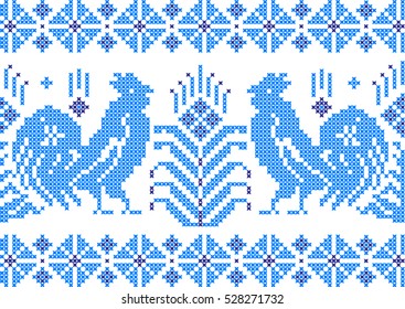 Two embroidered roosters