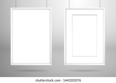 Two empty white frames with passe-partout and without it for an image or photo above the surface. Mockup for design with shadow