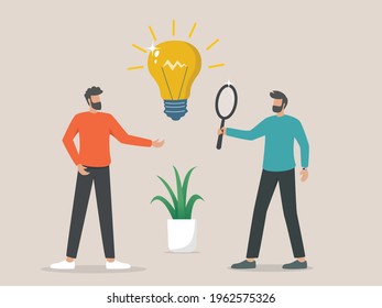 Two entrepreneurs analyzing a business idea