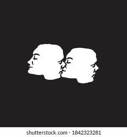Two face kissing each other