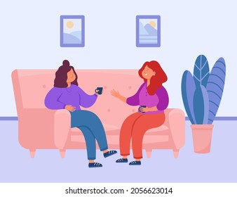 Two female characters drinking tea or coffee at home. Happy women holding conversation and having fun sitting on comfy couch flat vector illustration. Friendship and leisure time concept