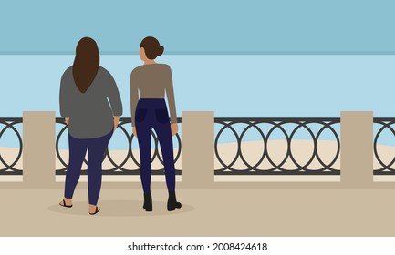 Two female characters stand on the embankment and look at the water