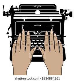 Two female hands with long nails typing on vintage mechanical typewriter. Creative concept.