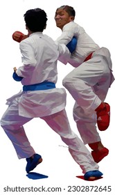 Two fighter are compete in arena during for karate match. A fighter tries to hit his opponent while jumping