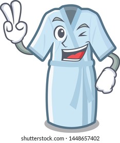 Two finger bathrobe is placed above mascot table