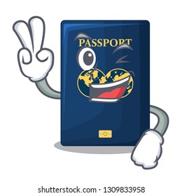 Two finger blue passport above character wooden table