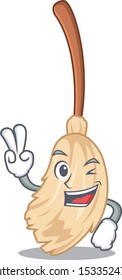 Two finger broom with the in cartoon shape