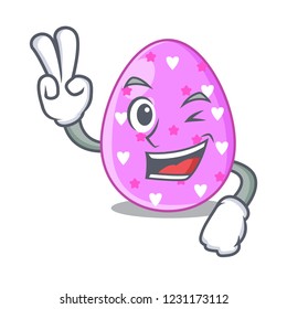 Two finger cartoon shape easter color on eggs