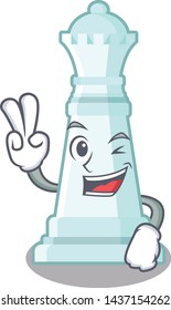 Two finger chess queen on the mascot chessboard