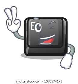 Two finger E button attached to cartoon keyboard