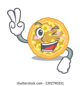 Two finger hawaiian pizza in the mascot shape