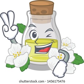 Two finger jasmine oil bottle above mascot table