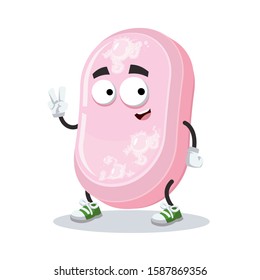 Two finger victory sign cartoon bar of pink soap character mascot smiling on white background