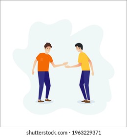 Two firends standing and shaking hands. 