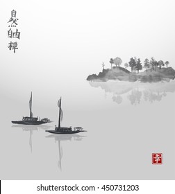 Two fishing boats and island with trees in fog. Traditional Japanese ink painting sumi-e. Contains hieroglyph - happiness.