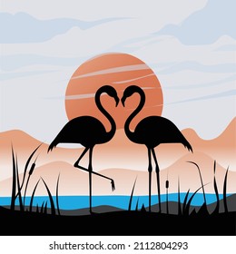 two flamingo silhouette shaped of heart with moon as background