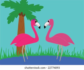 Two flamingos looking at each other.