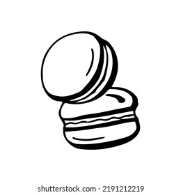 Two fresh stuffed macaroons puff pastries black and white isolated on white background