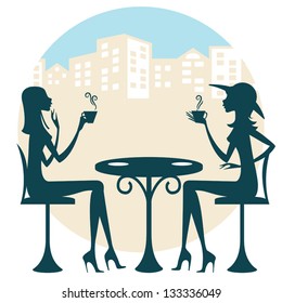 Two friends having a drink and talking