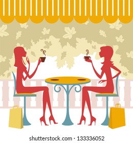 Two friends having a drink and talking