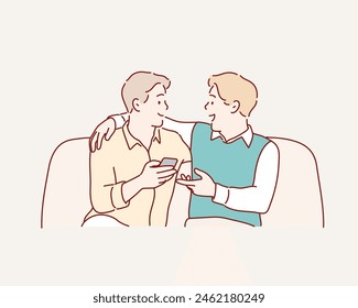 Two friends talking sitting in a couch in the living room. Hand drawn style vector design illustrations.