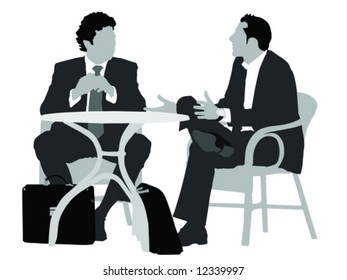 Two Gentlemen Sitting   At Coffee Table