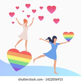 Two girls dancing with pink and rainbow heart. Gay couple with LGBT symbols. Homosexuality concept. Vector illustration can be used for topics like LGBTQ pride, wedding, diversity, love