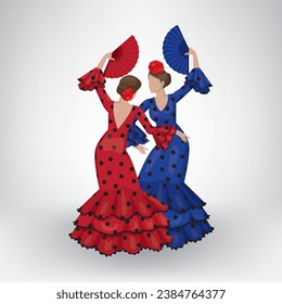 Two girls dressed in traditional flamenco costume dancing "Sevillanas"