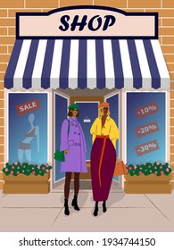 Two girls in front of the store. Sale, discounts. Fashion