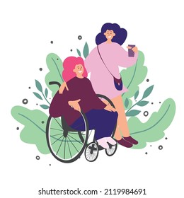 Two girls are having a fun conversation. One of them is in a wheelchair