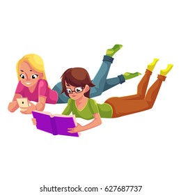 Two girls, one reading book, another playing with mobile phone, lying on floor, cartoon vector illustration isolated on white background. Women, girls reading book and using smartphone, mobile phone