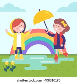 Two girls playing in the rain and rainbow. Kids dressed in raincoats and rubber boots with umbrella enjoying puddle on the grass. Modern flat vector illustration clipart.