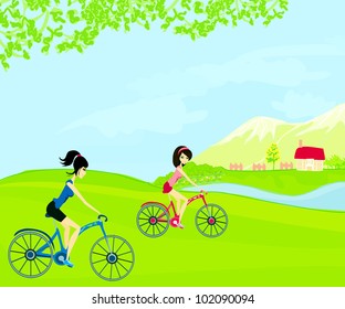 two girls relax biking