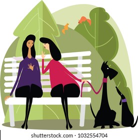 two girls talking sitting on a bench in the Park