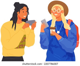 Two girls are texting on mobile phone. Beautiful women are typing each other, show photos in phone gallery. Girlfriends are talking on smartphone, communication, chatting concept, information exchange