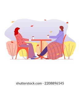 Two girls, women, sitting at a table outside with coffee, cafe, conversation, autumn, warm clothes, sweaters, plaid