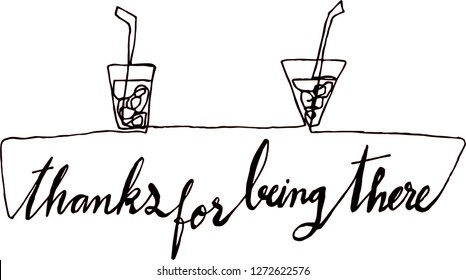 Two glasses of ice coffee on the table. Thanks for being there hand writing for friendship.