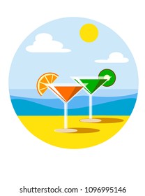 two glasses martini on a sunny beach with fruit slices