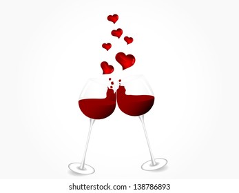 Two glasses with red wine and hearts