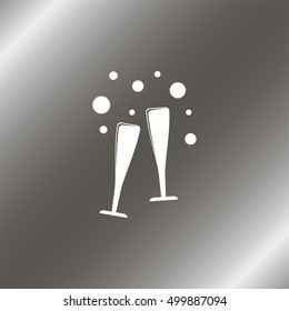 Two glasses of wine or champagne.