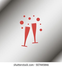 Two glasses of wine or champagne.