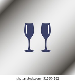 Two glasses of wine or champagne.