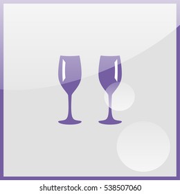 Two glasses of wine or champagne.