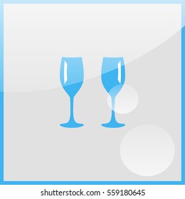 Two glasses of wine or champagne.