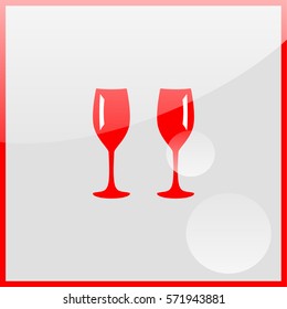 Two glasses of wine or champagne.