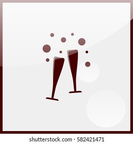 Two glasses of wine or champagne.